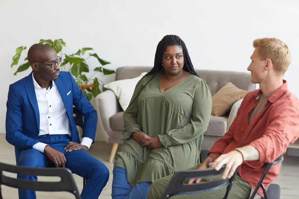 therapists discussing in a group